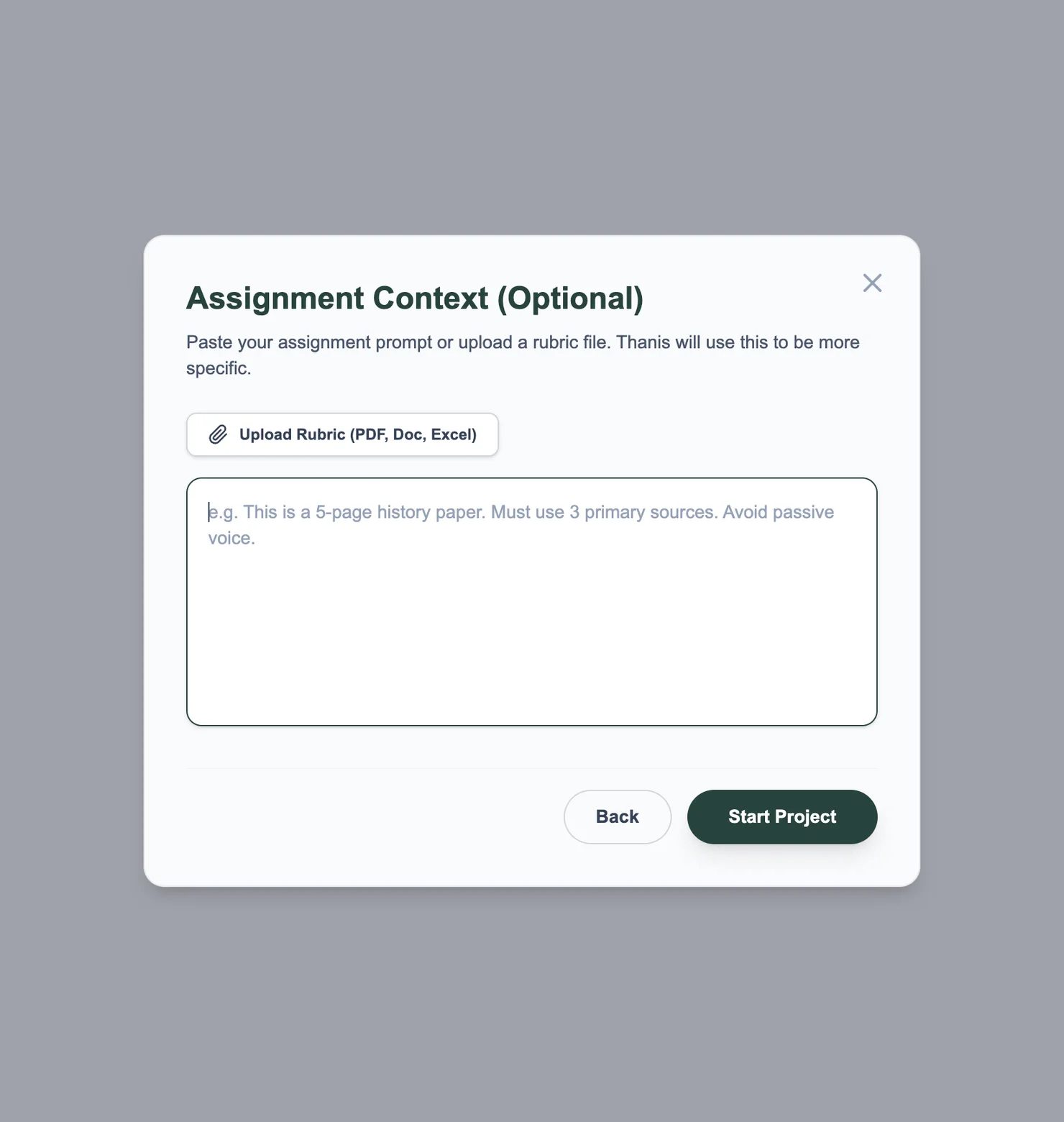 Thanis Academic setup — the Assignment Context step where a student pastes the prompt or uploads a rubric file.